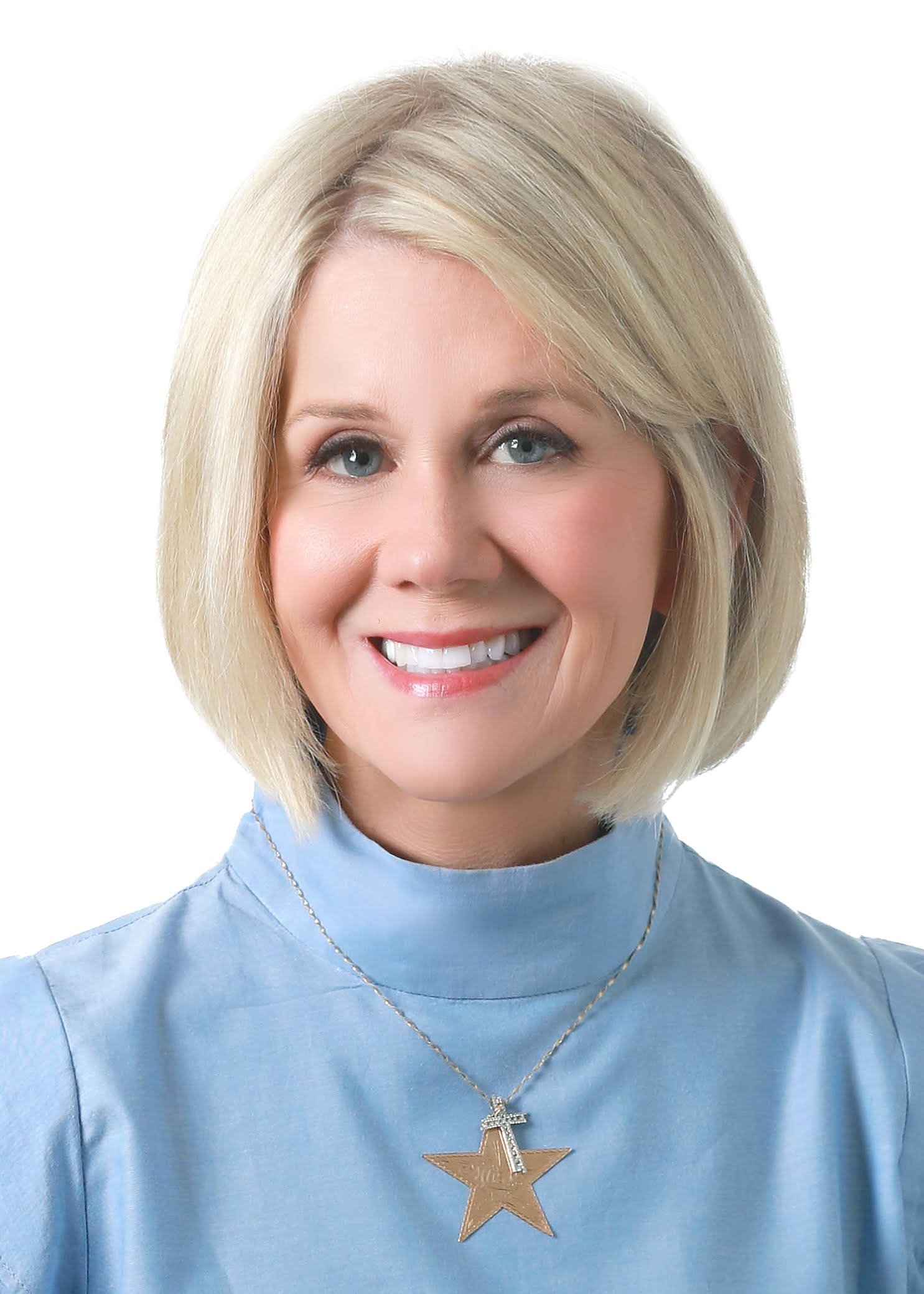 A woman with blonde hair wearing blue shirt.